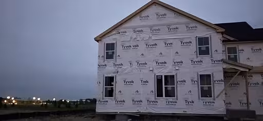 A house with house wrap in Michigan.