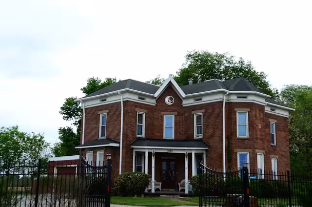 An older brick home that could be a duplex.