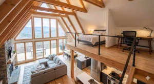 The interior of a modern a-frame cabin.