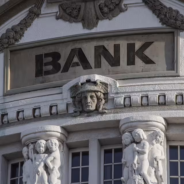 The stone front of a bank.