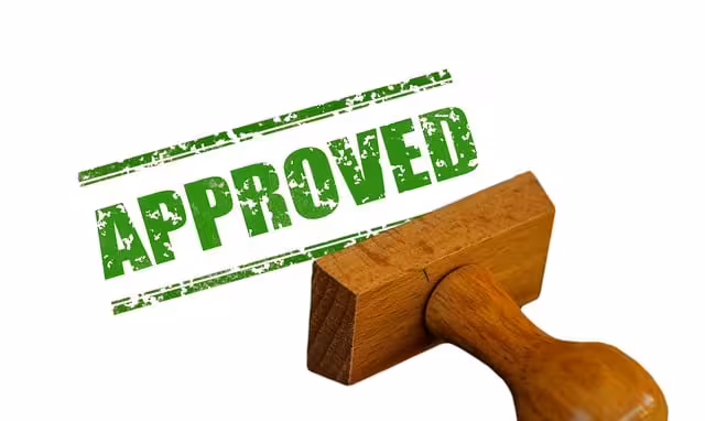 Green approved with a rubber stamp.