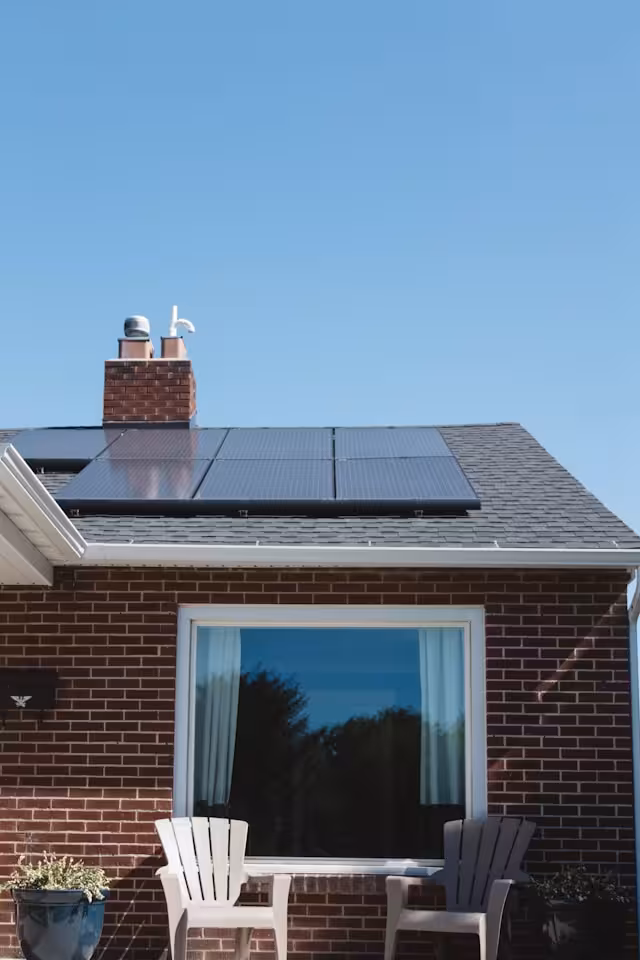 A home with solar panels on the roof.