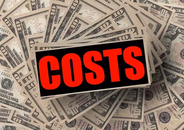 Costs in red letters on money.