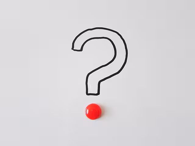 A question mark on a white background.