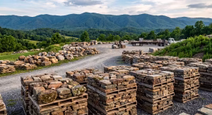 Appalachian fieldstone stacked in a lot.